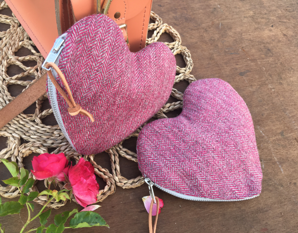 tweed heart shaped pouches on a wooden table