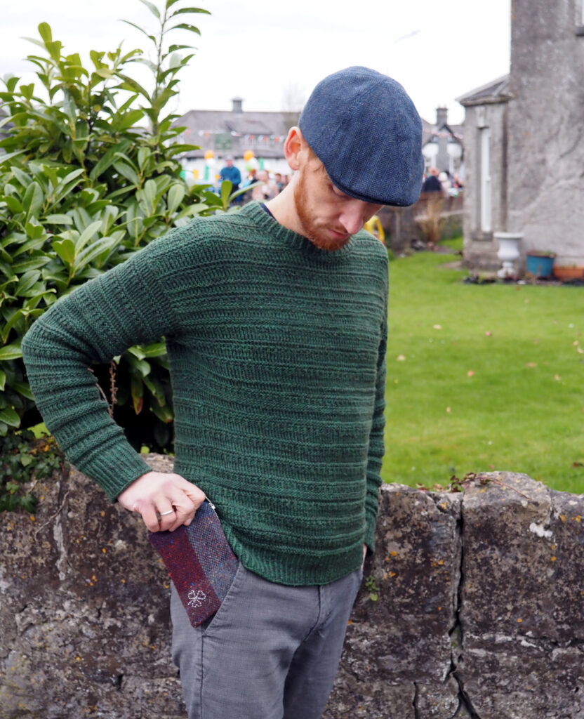 Man holding Irish Tweed Pouch